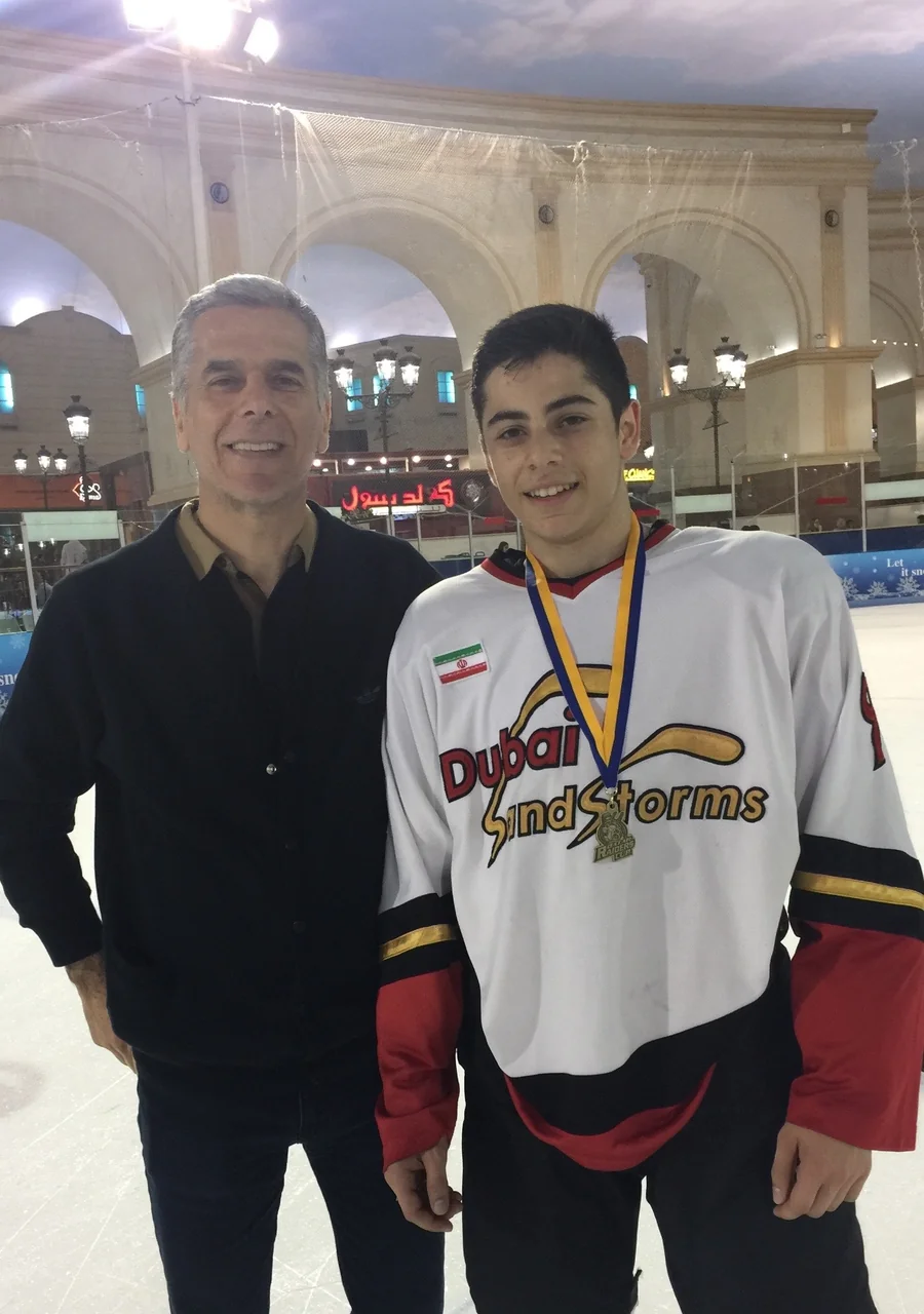 Emad Deznabi in Dubai Sandstorms kit with a medal